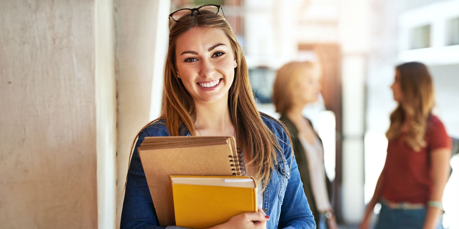 College girl with books