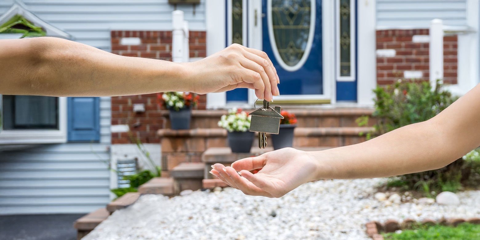 Handing over keys to a house