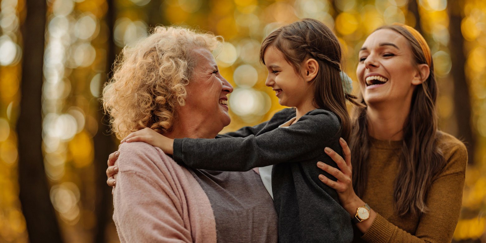 Grandmother holding grand daughter